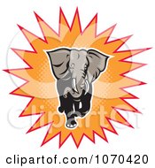 Clipart Charging Elephant And Orange Burst Royalty Free Vector Illustration