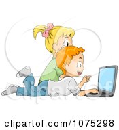 Two Children Searching The Internet On A Laptop Computer