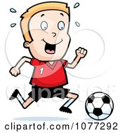 Poster, Art Print Of Caucasian Soccer Boy Running After A Ball