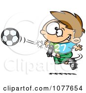 Boy Kicking A Soccer Ball