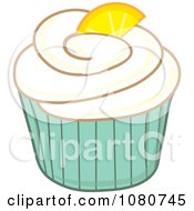 Clipart Vanilla Frosted Cupcake With A Lemon Wedge And Green Wrapper Royalty Free Vector Illustration