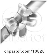 Gift Present Wrapped With A Silver Or Grey Bow And Ribbon