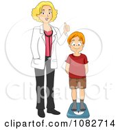 Pediatric Doctor Measuring A Boys Weight