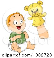 Poster, Art Print Of Baby Boy Laughing At A Hand Puppet