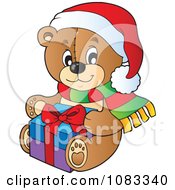 Clipart Christmas Teddy Bear Holding A Present Royalty Free Vector Illustration by visekart