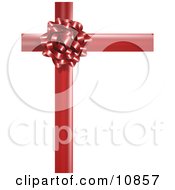 Gift Present Wrapped With A Red Bow And Ribbon