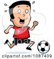 Athletic Boy Playing Soccer