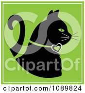 Poster, Art Print Of Black Profiled Cat With A Heart Collar On Green