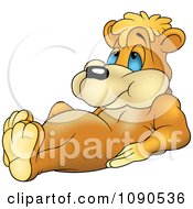 Clipart Relaxing Golden Bear Royalty Free Vector Illustration