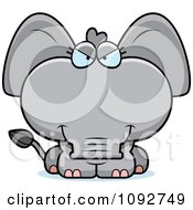 Clipart Sly Baby Elephant Royalty Free Vector Illustration