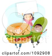 Children In Hamburger And Pickle Costumes With A Sign