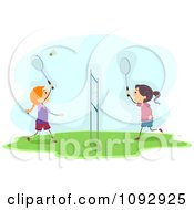 Happy Girls Playing Badminton