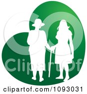 Poster, Art Print Of Silhouetted Nurse Helping An Elderly Woman With A Cane Over A Green Heart