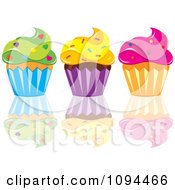 Poster, Art Print Of Cupcakes With Green Yellow And Pink Frosting And Sprinkles With A Reflection