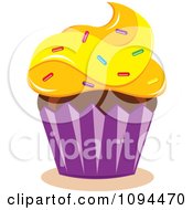 Clipart Cupcake With Yellow Frosting And Sprinkles Royalty Free Vector Illustration