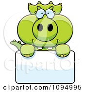 Clipart Green Baby Triceratops Holding A Blank Sign Royalty Free Vector Illustration