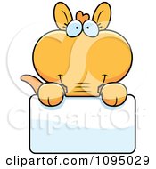 Clipart Orange Aardvark Holding A Sign Royalty Free Vector Illustration by Cory Thoman