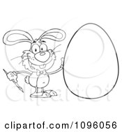 Clipart Outlined Happy Bunny Painting An Easter Egg Royalty Free Vector Illustration