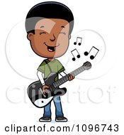 Black Adolescent Teenage Boy Playing A Guitar