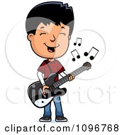 Adolescent Teenage Boy Playing A Guitar