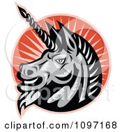 Clipart Retro Woodcut Angry Gray Unicorn Head Over Orange Rays Royalty Free Vector Illustration