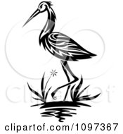 Clipart Black And White Crane Wading In A Marsh Royalty Free Vector Illustration