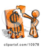 Orange Businessman Putting A Dollar Sign Puzzle Together