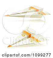 Clipart Two 3d White And Orange Paper Airplanes Royalty Free Vector Illustration