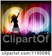 Poster, Art Print Of Silhouetted Female Singer On Stage With Fans Against Colorful Lights