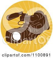 Poster, Art Print Of Retro Brown Video Camera In A Circle Of Rays