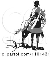 Poster, Art Print Of Retro Black And White Wrangler Cowboy Looking Back On A Horse
