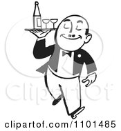 Retro Black And White Waiter Carrying Wine And Glasses On A Tray