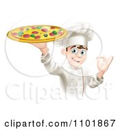 Happy Male Pizza Chef Gesturing Ok And Holding Up A Pie