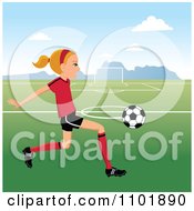 Poster, Art Print Of Blond Soccer Girl Player Kicking A Ball On A Field