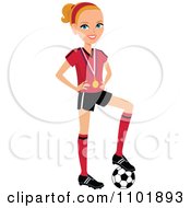Poster, Art Print Of Blond Female Soccer Player With A Medal Resting Her Foot On A Ball