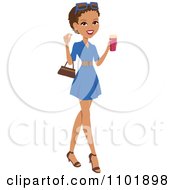 Stylish African American Or Hispanic Woman Holding A Beverage And Wearing A Blue Dress