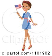 Patriotic African American Or Hispanic Woman Holding An American Flag And Wearing A Blue Dress