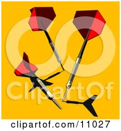 Three Darts On A Yellow Background Clipart Illustration
