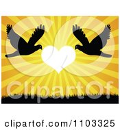 Poster, Art Print Of Silhouetted Doves Flying Against A Heart Sunset