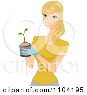 Poster, Art Print Of Pretty Blond Woman Holding A Seedling Plant In A Pot