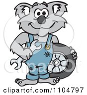 Happy Auto Mechanic Koala With A Wrench And Tire