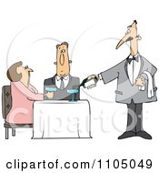Waiter Serving Wine To A Couple At A Restaurant