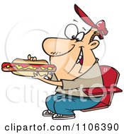 Poster, Art Print Of Sports Fan Man Eating A Hot Dog During A Game