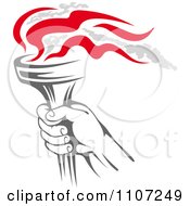 Clipart Gray Hand Holding A Flaming Olympic Torch Royalty Free Vector Illustration