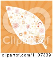Clipart Retro Styled Fall Leaf With A Pattern Over Orange Rays Royalty Free Vector Illustration by Amanda Kate