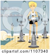 Happy Blond Woman Using Her Mp3 Player While Using A Spin Bike At The Gym