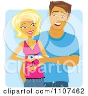 Happy Caucasian Couple Holding A Positive Pregnancy Test Over Blue