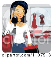 Happy Asian Woman Talking On A Cell Phone While Shopping In A Store