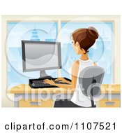 Poster, Art Print Of Brunette Businesswoman Working At Her Desk In A City Office 1