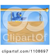 Poster, Art Print Of Bluebird Perched On And Presenting A Hanging Wood Sign Against A Sky